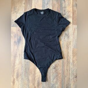 black short sleeve body suit